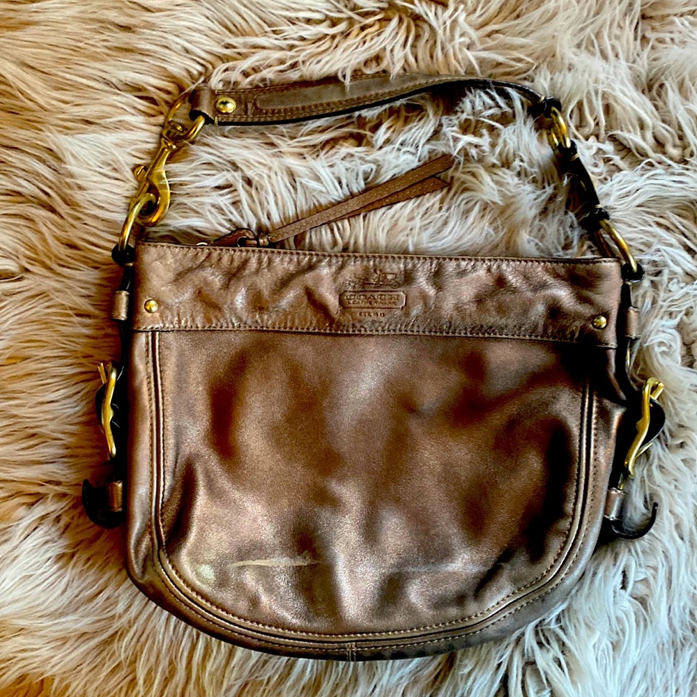 Coach gold bag with unique gold hardware